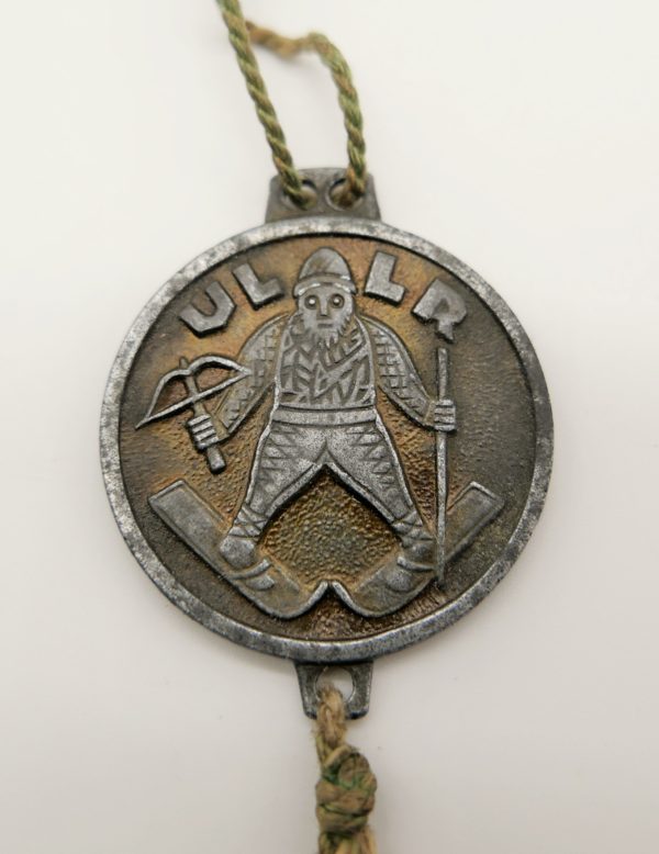 Ullr - Glücksbringer eines Gebirgsjäger - Rückseitig das historische Wappen des Landes Salzburg