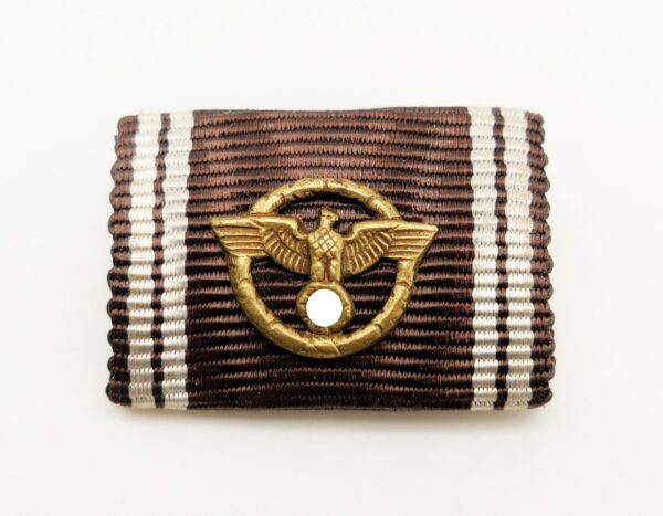 Feldspange mit dem Band der NSDAP Dienstauszeichnung - Bronzestufe mit Adler Auflage