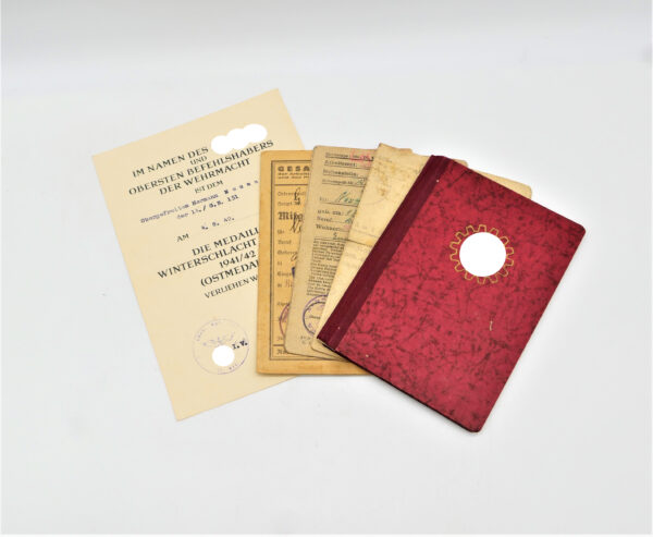 Urkunde zur Medaille Winterschlacht im Osten - Eines Obergefreiten des 14./G.R. 151 - DAF Ausweis
