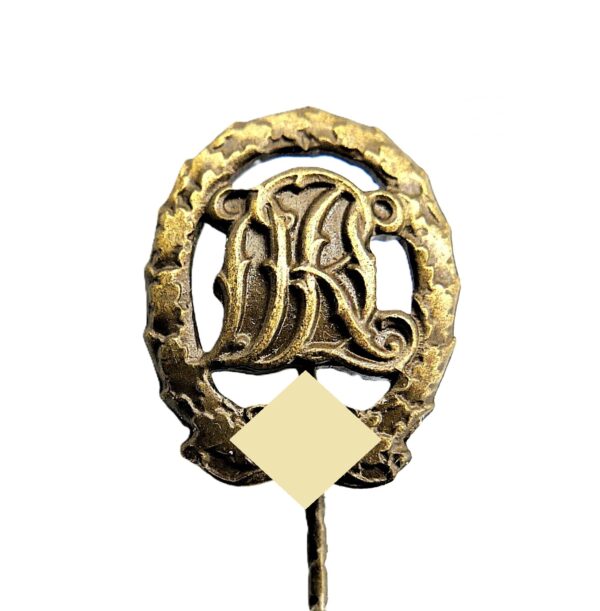17 mm Miniatur zum DRL Sportabzeichen Bronze – Hersteller ST & L. (Steinhauer & Lück, Lüdenscheid)