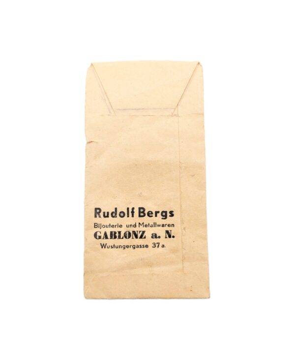 Universal Verleihungstüte - Rudolf Bergs, Bijouterie und Metallwaren, Gablonz a. N., Wustungergasse 37 a - Tüte