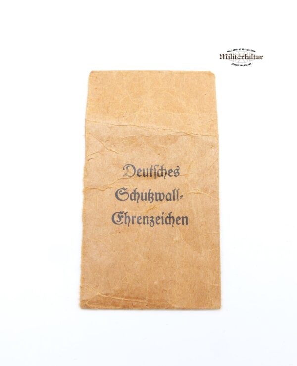 Schutzwall – Ehrenzeichen mit Verleihungstüte – Hersteller Sohni, Heubach & Co., Oberstein – Bild 4